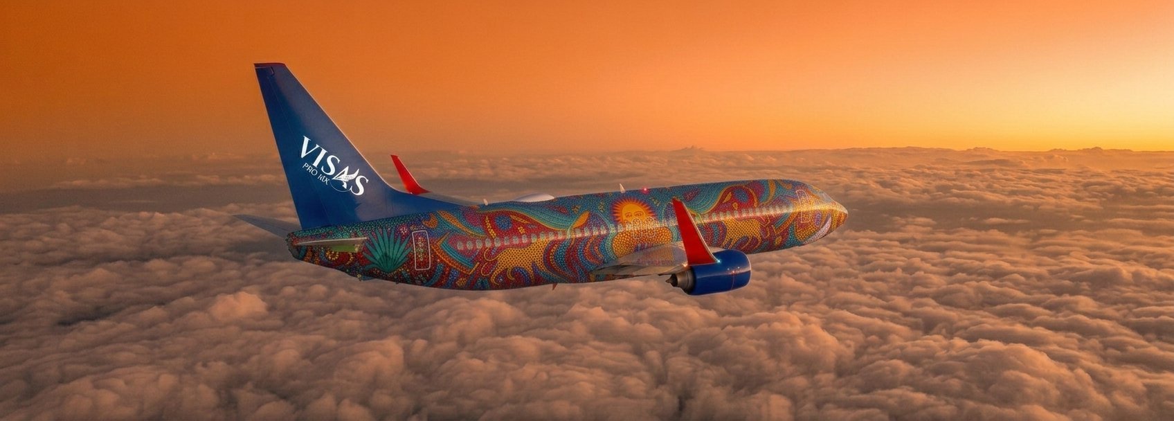 Southwest Airlines aircraft flying above clouds during sunset with blue tail and colorful fuselage design